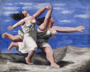 Dos mujeres corriendo en la playa